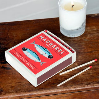 long matches with red tips in a mackerel fish design box