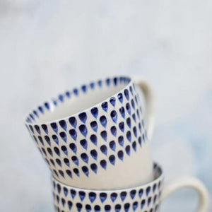 Nkuku indigo drop ceramic mugs stacked