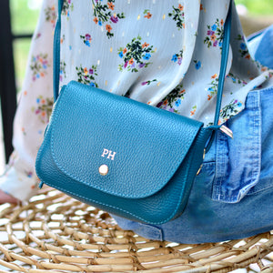 Monogrammed teal blue leather small crossbody bag saddlebag