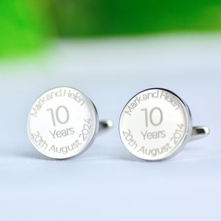 10th Anniversary Cufflinks with personalised engraving "Mark and Helen 20th August 2024" shown in close up shot