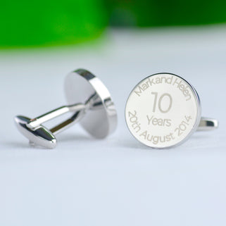 10th Anniversary Cufflinks with personalised engraving "Mark and Helen 20th August 2024" shown in close up shot