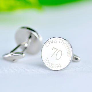 Personalised milestone 70th birthday cufflinks with "Chris Thomas" engraved around the top and "10.02.54" engraved around the bottom 