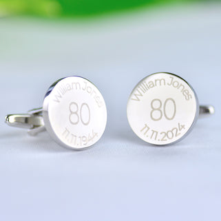Personalised milestone 80th birthday cufflinks with "William Jones" engraved around the top and "11.11.1944/11.11.2024" engraved around the bottom 