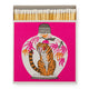 pink square match box with tiger design on the front