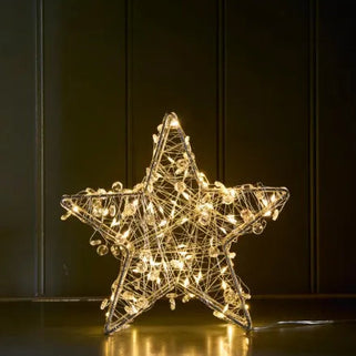 Star-shaped decorative light on a dark background