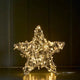 Star-shaped decorative light on a dark background