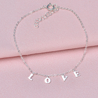 Close up of love charm bracelet