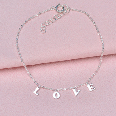 Close up of love charm bracelet