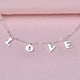 Close up of love charm bracelet