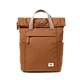 A brown canvas roll-top backpack with light gray handles and a small white rectangular brand patch on the front, photographed against a solid white background.