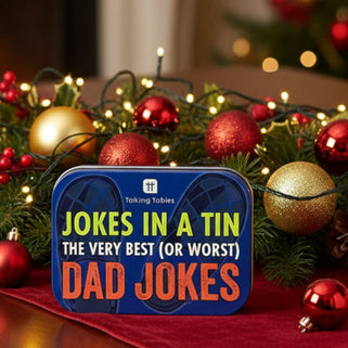 Tin box with 'Jokes in a Tin' text on a white background