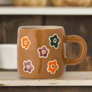brown espresso mug with bright flowers