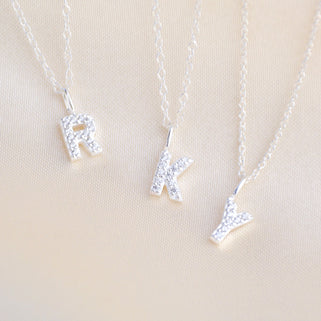 Sparkle Tiny Initial Necklaces close up - Letter R, K & Y