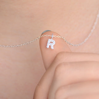 Sparkle Tiny Initial R Necklace shown in close up
