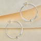 Sterling Silver large Hoop Earrings With Beads shown close up .