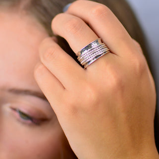 Hammered Sterling Silver Beaded band Spinning Ring shown close up on a model.