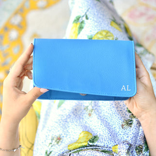 Royal Blue Personalised Carry All Travel Wallet with Card Holder Purse shown in overhead shot held by model