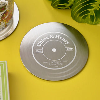 Personalised Couples Coaster shown with engraved example of "Chloe & Henry" and custom message "Henry, one year down forever to go xxx"