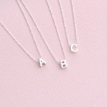 Girls slider necklace with choice of ball chain shown close up