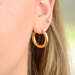 Waterproof Classic Wide Hoop Earrings Gold shown on model close up