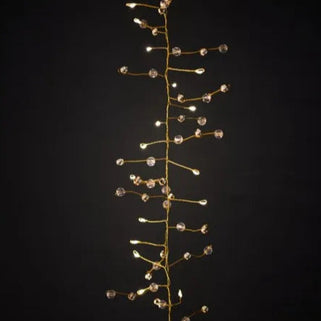 Decorative string of lights on a black background