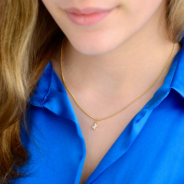 Gold Sparkle Kiss necklace shown close up