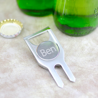 Personalised golf marker and bottle opener shown close up in polished silver finish