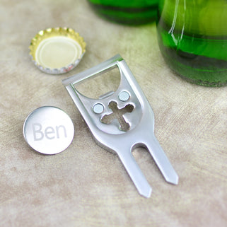 Personalised golf marker and bottle opener shown close up in polished silver finish showing ball marker