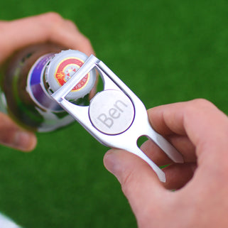Personalised golf marker and bottle opener shown close up in polished silver finish