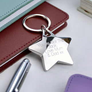 Silver star keyring with "You've got This Jack. Love Mum & Dad xx" engraved on the front shown in close up shot.