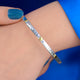 Sterling Silver Mia Hearts Bangle shown close up on model
