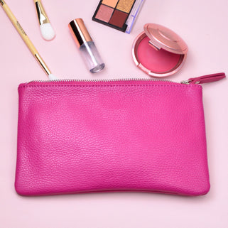 Personalised Small Leather Cosmetics Bag shown close up in fuchsia