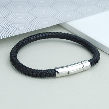 Men's Easy Clasp Leather Plait Bracelet shown close up- antiqued black