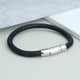 Men's Easy Clasp Leather Plait Bracelet shown close up- antiqued black