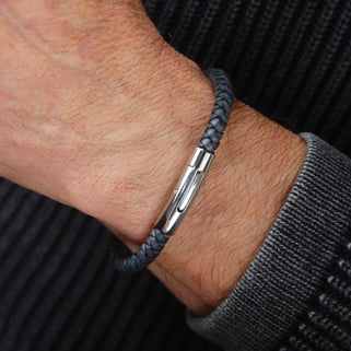 Men's Easy Clasp Leather Plait Bracelet shown close up on  model - antiqued black