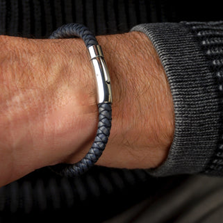 Men's Easy Clasp Leather Plait Bracelet shown close up on  model - antiqued black