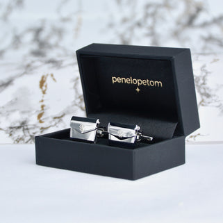 Lucky clover cufflinks shown in black Penelopetom cufflinks box
