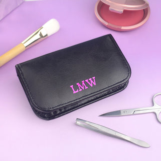 Personalised Girl's Manicure Kit with initials "LMW" monogrammed in pink foil shown on pink background.