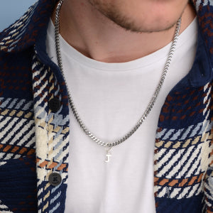 Personalised Men's Stainless Steel Chain And Initial Necklace  shown close up on model with standard  wheat link chain and letter J