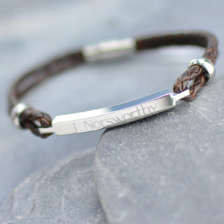 Personalised Men's Leather Slim Bar Bracelet shown in brown leather close up .