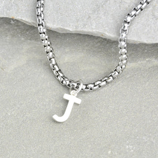Box link chain with letter J shown close up