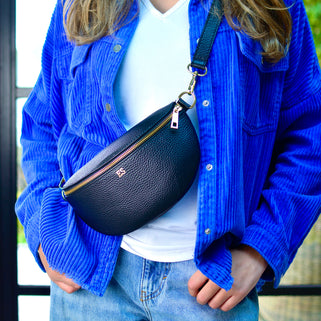 Black Monogram Leather Half Moon Chest Bag with gold foil monogram ES