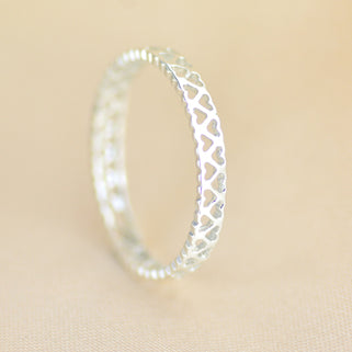 Filigree open Hearts Ring shown close up.