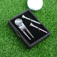 Golf Ball marker and tee set shown close up with engraving on ball marker shown close up in black gift box