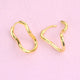Gold Organic Twist Hoop Earrings shown close up with hinge detailing