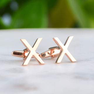 Rose gold kiss cufflinks shown in close up shot