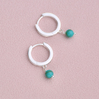 Sterling Silver Turquoise Dangle Huggie Earrings shown close up