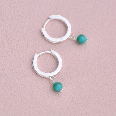 Sterling Silver Turquoise Dangle Huggie Earrings shown close up