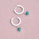 Sterling Silver Turquoise Dangle Huggie Earrings shown close up