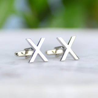 silver kisses cufflinks shown in close up shot